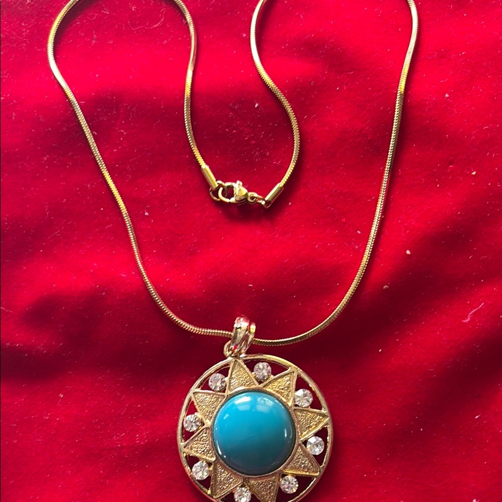 Gold and Blue Necklace with Ornate Medallion Pendant